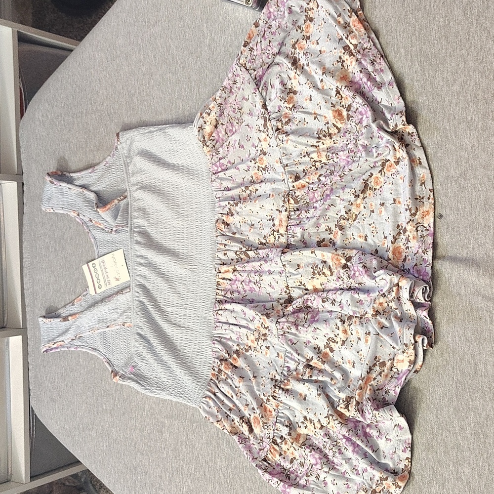 Floral Sleeveless Peplum Top BE STAGE